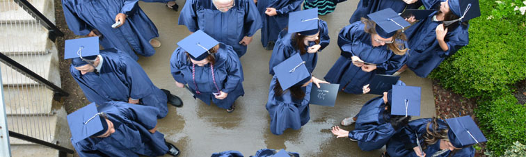 Graduates gather after the commencement ceremony